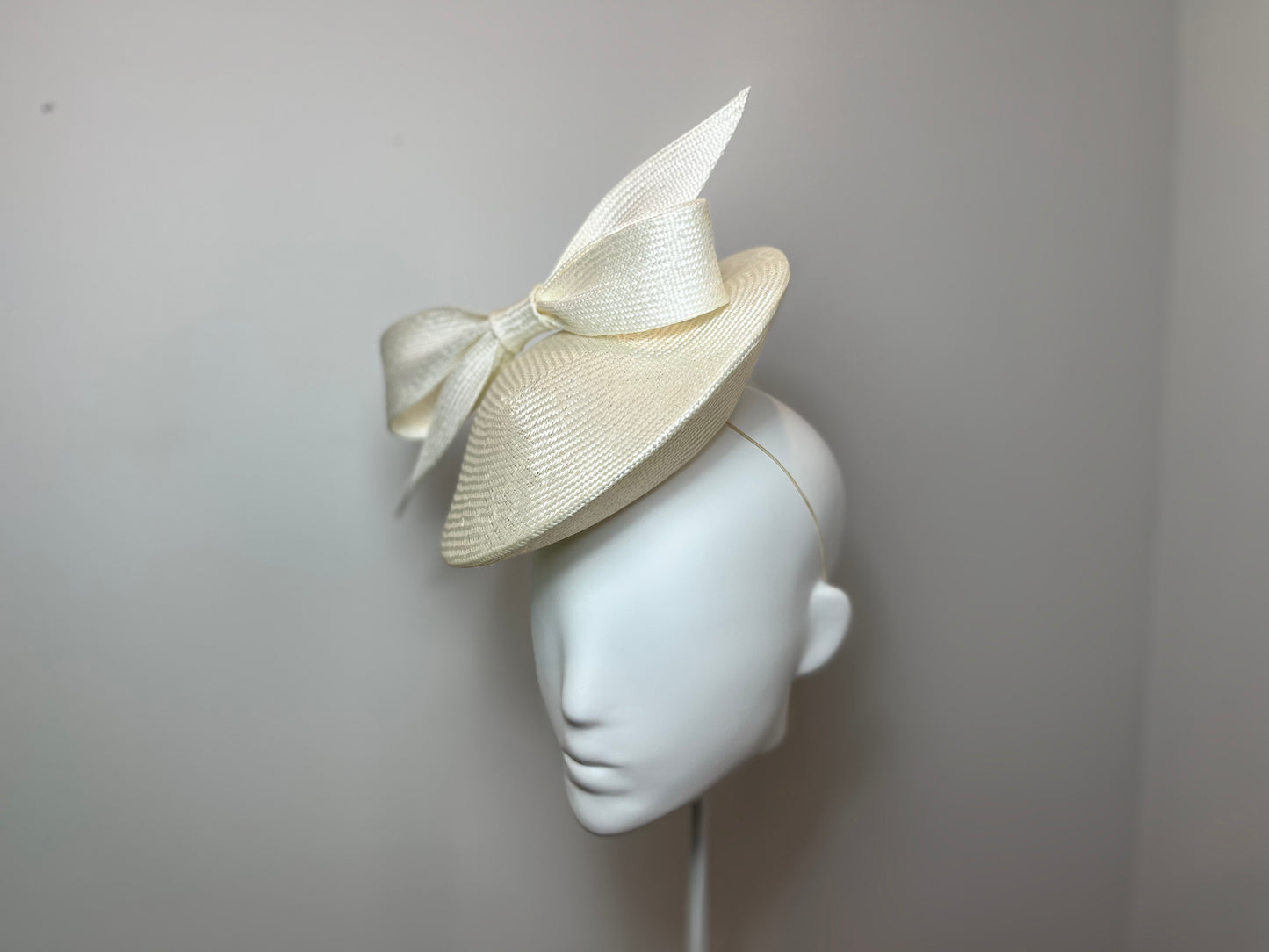 Ivory Percher with sculptured bow