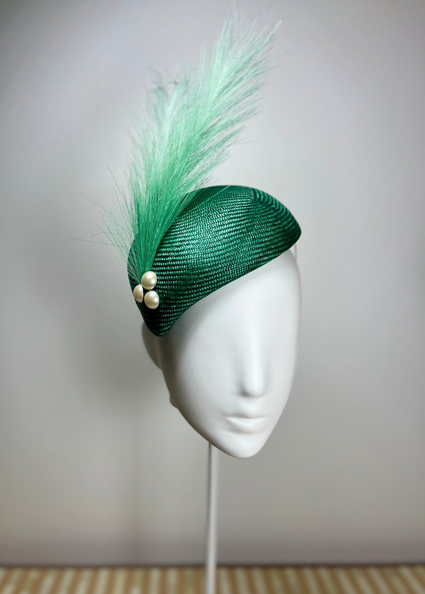 Green feather w pearl
