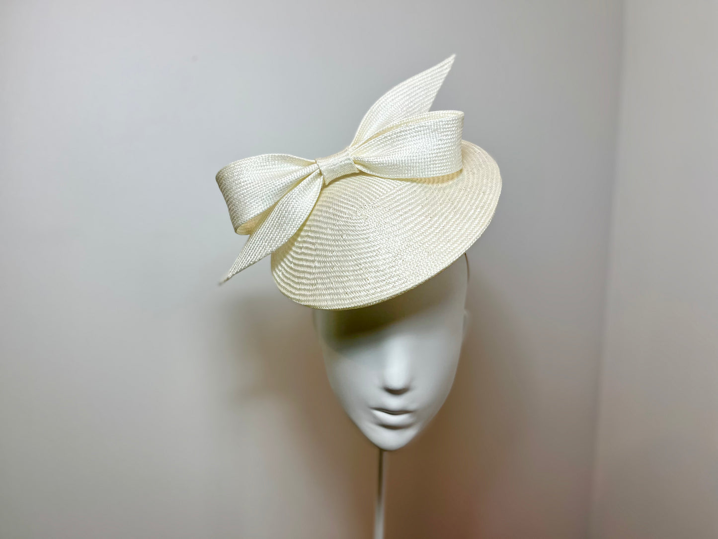 Ivory Percher with sculptured bow