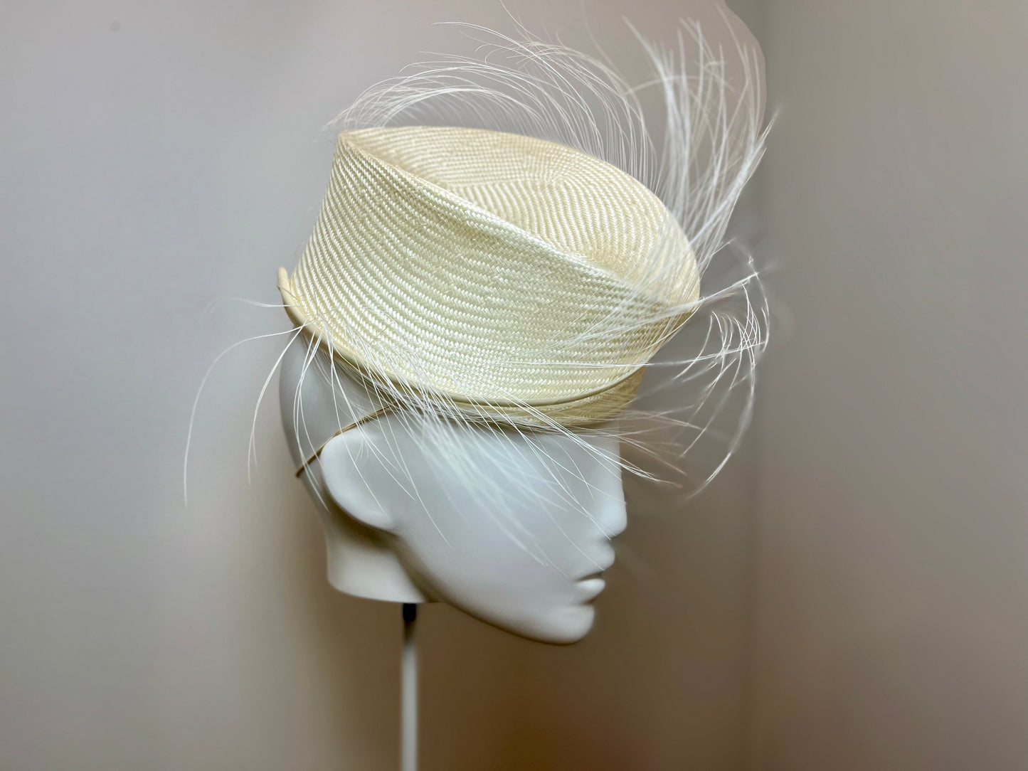 Ivory spiral crown with feather spray