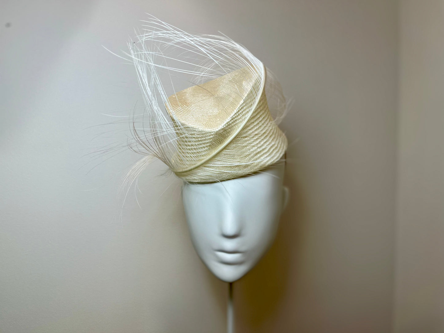Ivory spiral crown with feather spray
