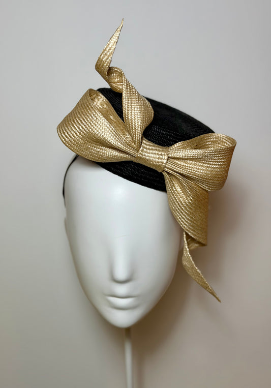Black pillbox with sculptured bow