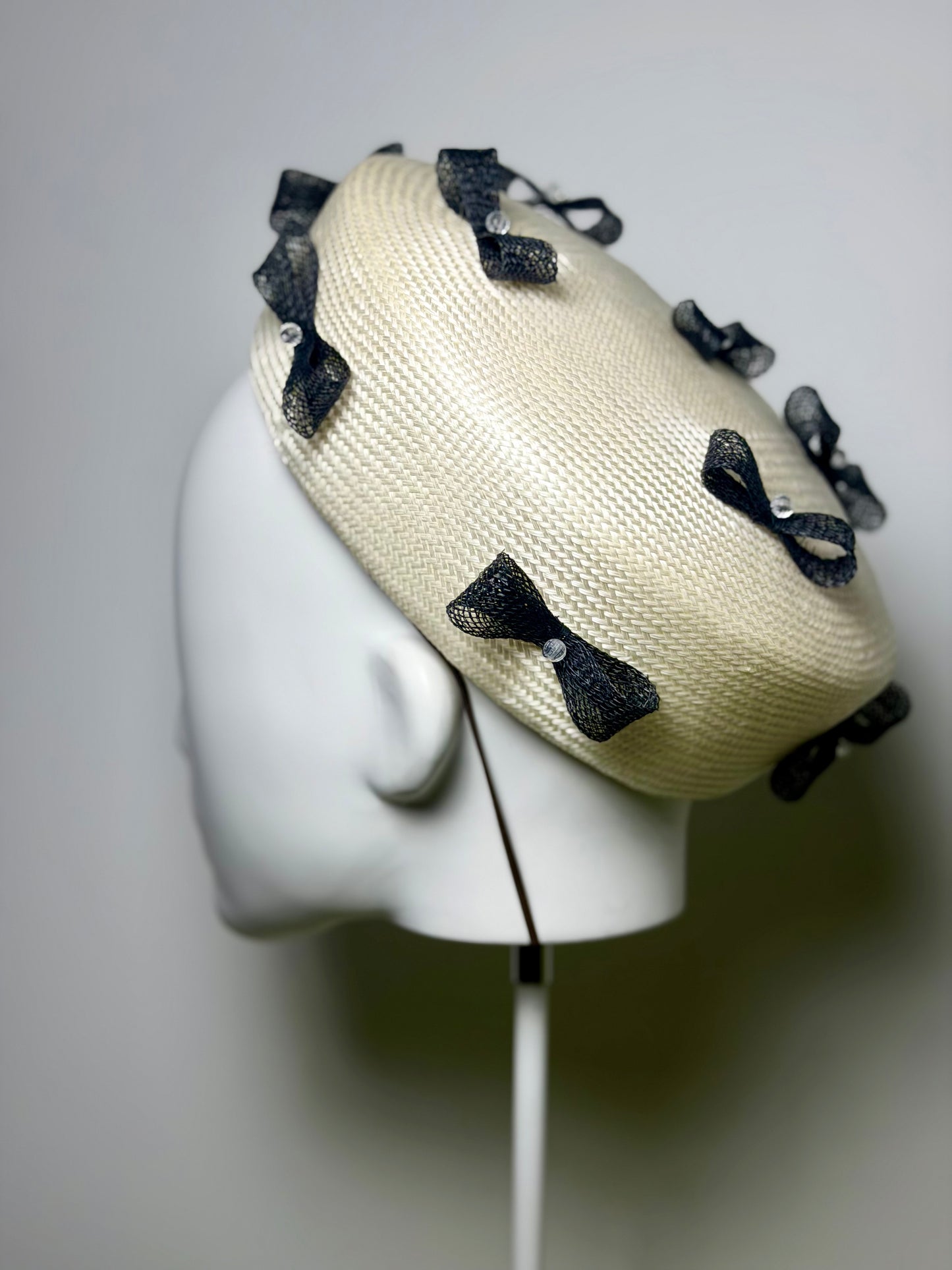 Ivory and black bow pillbox